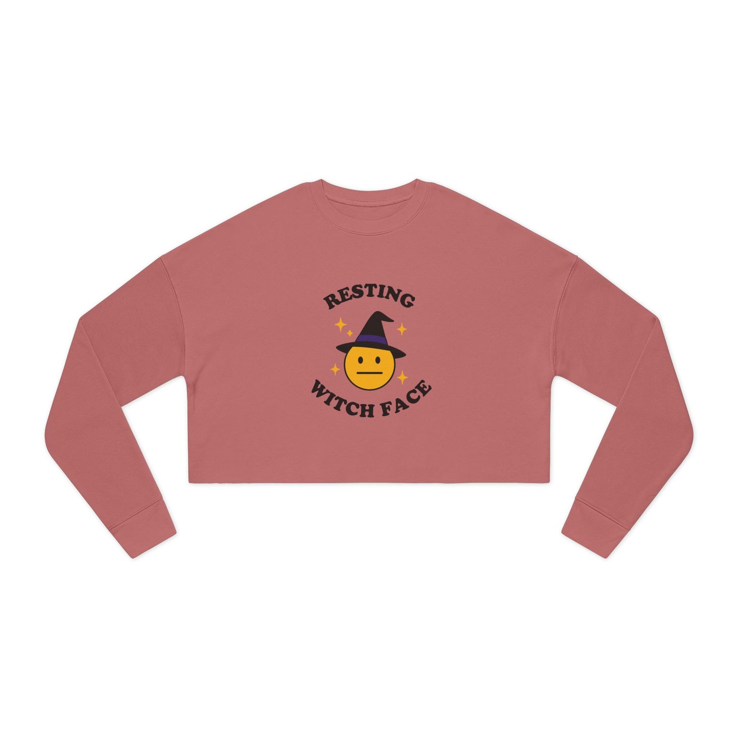 Pink long-sleeve crop top with 'Resting Witch Face' design on a white background