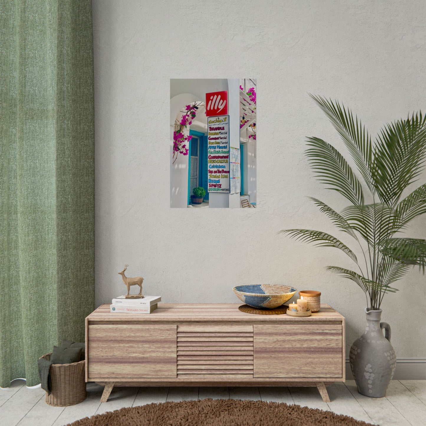 Wooden sideboard with decorative items against a wall with a framed picture and plant.