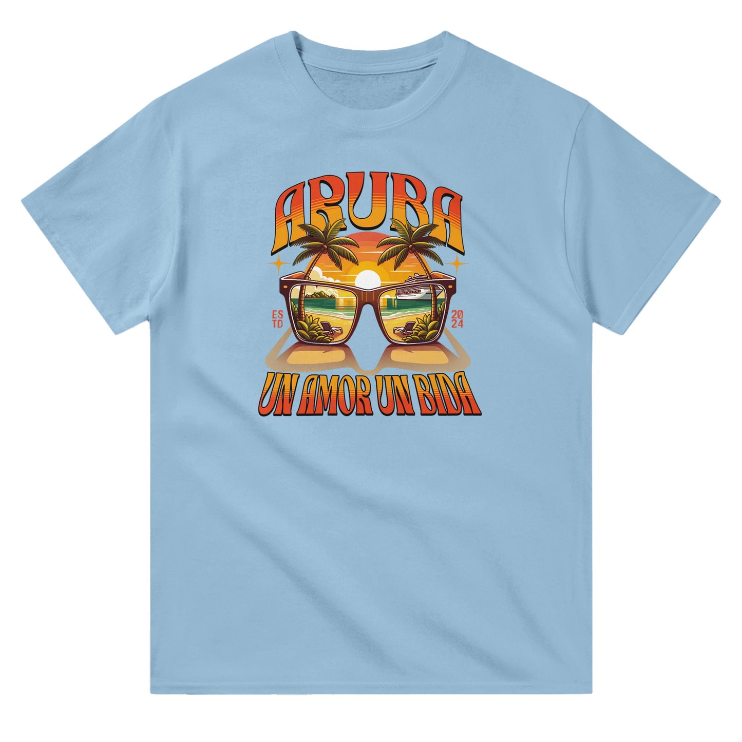 Blue unisex crewneck T-shirt with “Aruba – Un Amor, Un Bida” graphic, palm trees, and sunset island design.