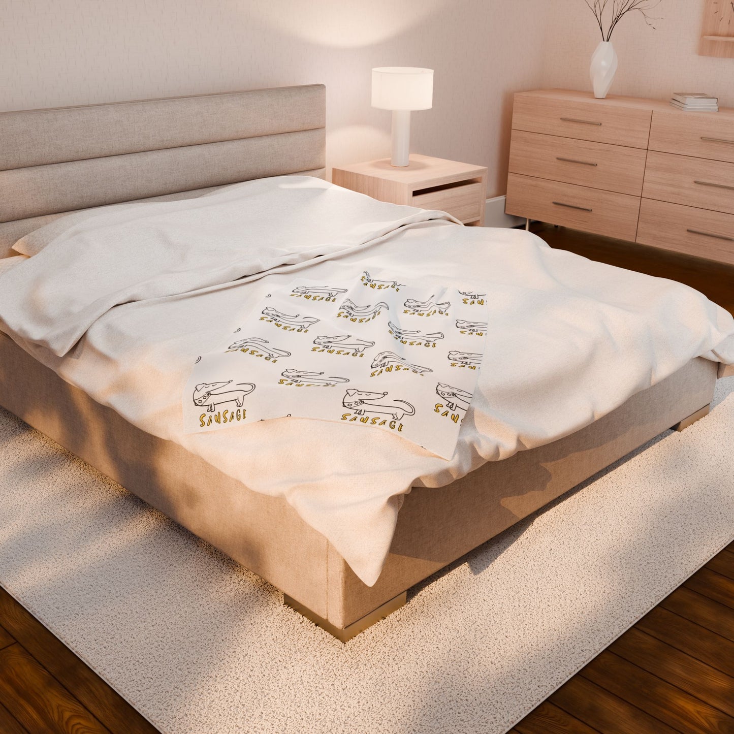 Sausage dog blanket with subtle gold text accents