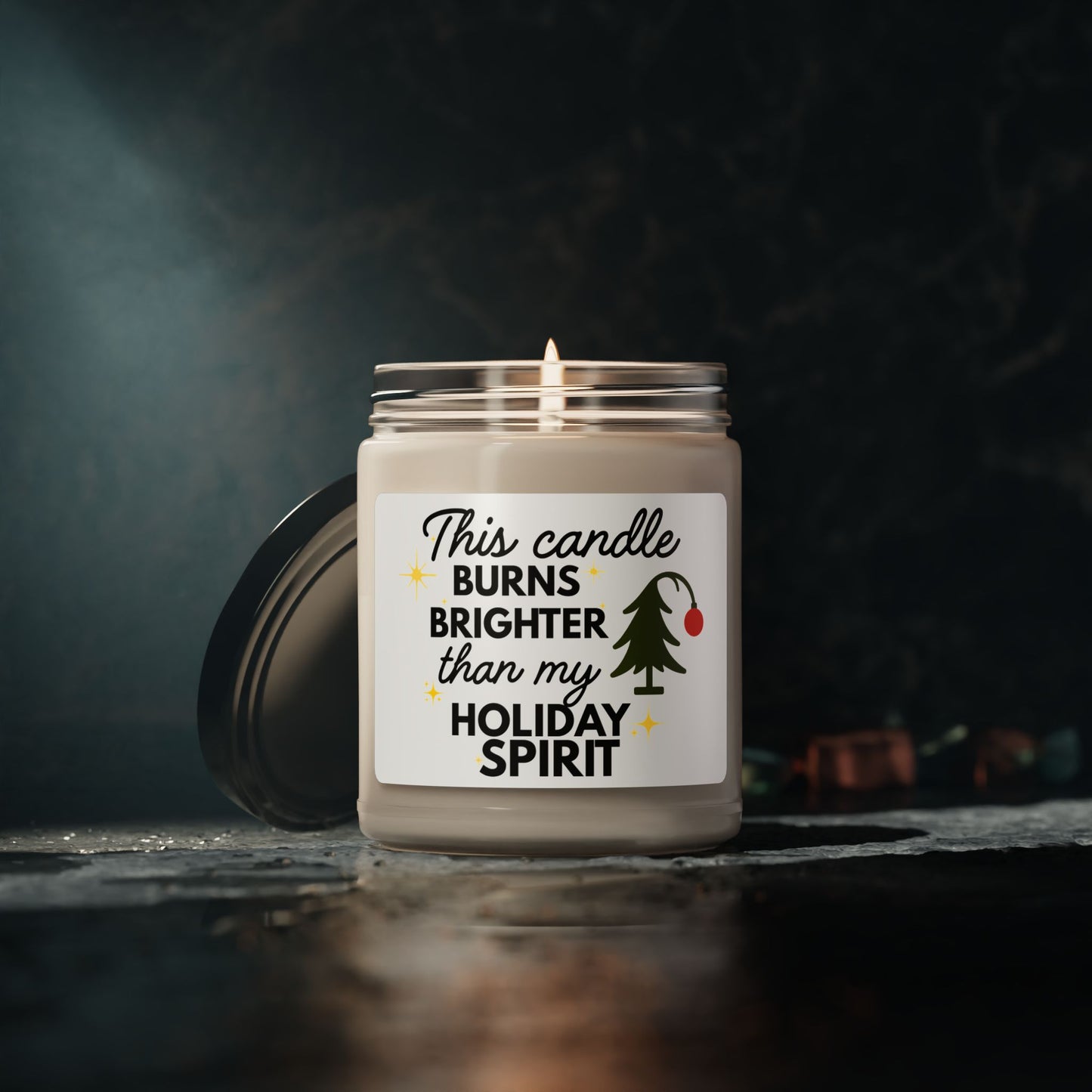 Candle with a humorous label on a dark background