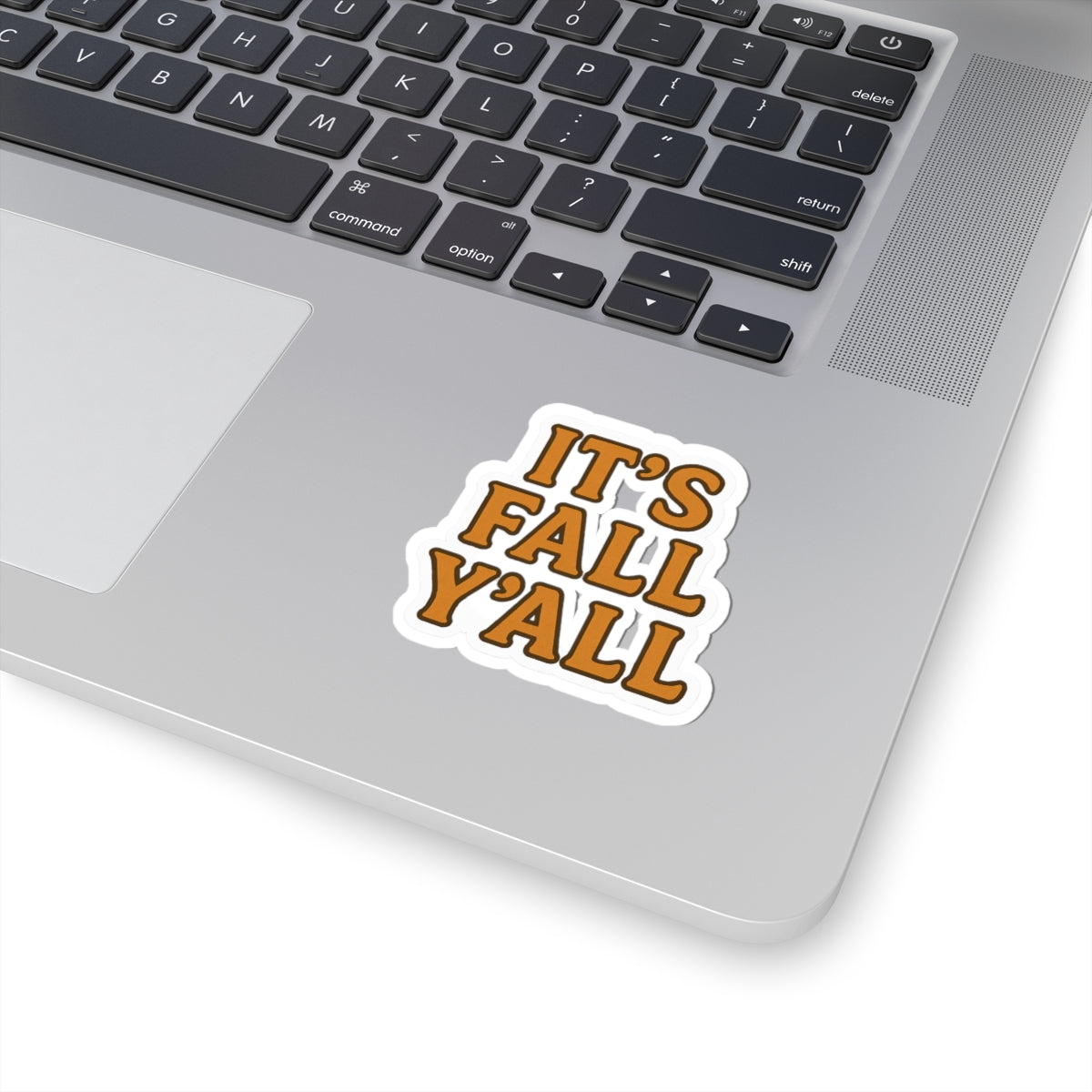 Laptop with a 'It's Fall Y'all' sticker on the palm rest area