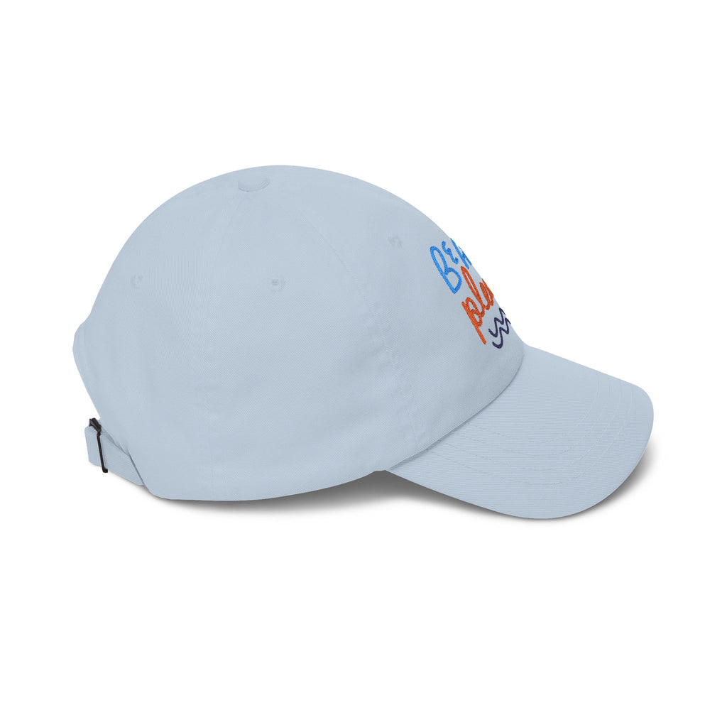 Light blue dad cap with embroidered 'Beach Please' text, side view on a white background