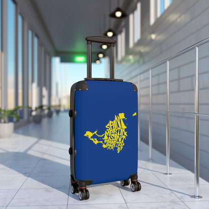 Blue suitcase with yellow text in an airport terminal