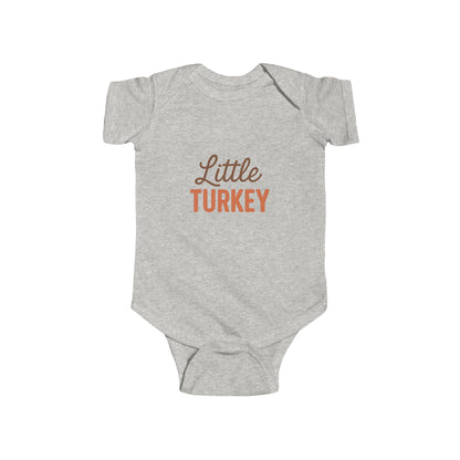 Gray baby onesie with 'Little Turkey' text on a white background