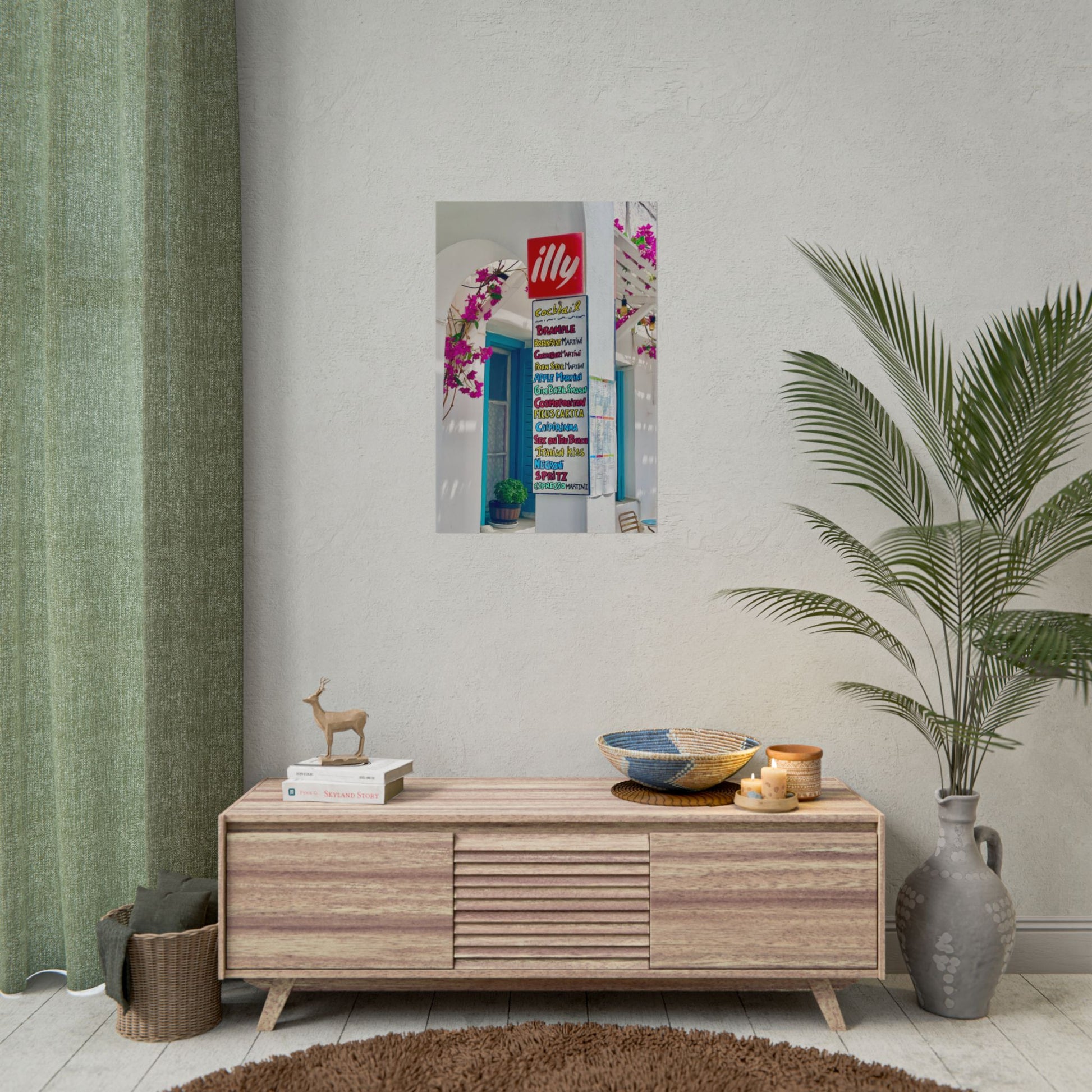 Wooden sideboard with decorative items against a wall with a framed picture and plant.
