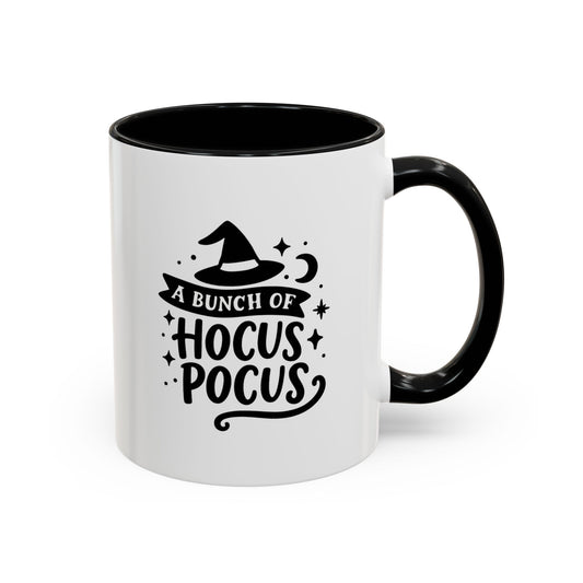 White mug with black handle featuring a Halloween-themed design and text.