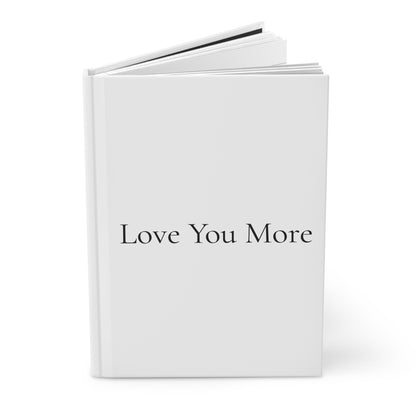Journal with "Love You More" standing on its side