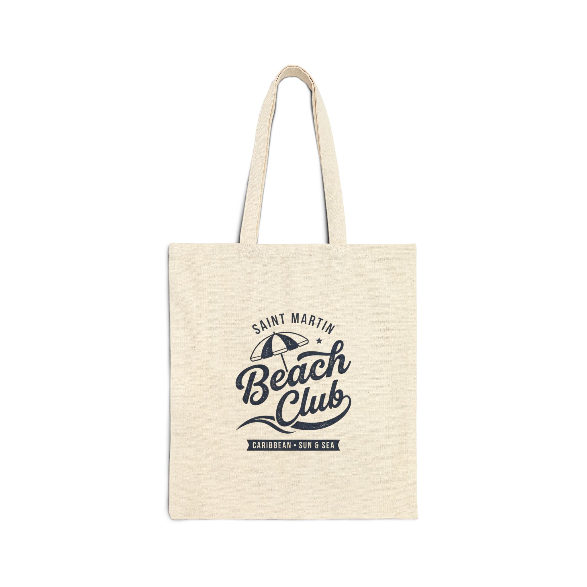 Beige tote bag with 'Saint Martin Beach Club' text and logo on a white background