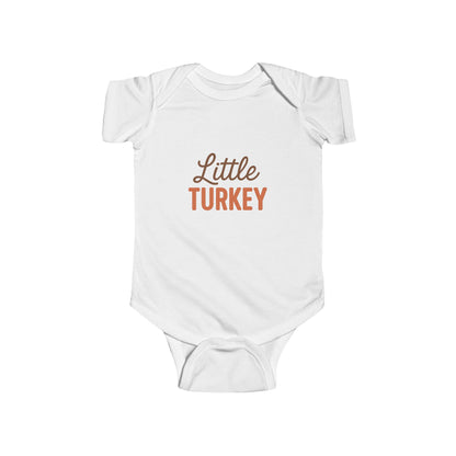 White baby onesie with 'Little Turkey' text on a white background