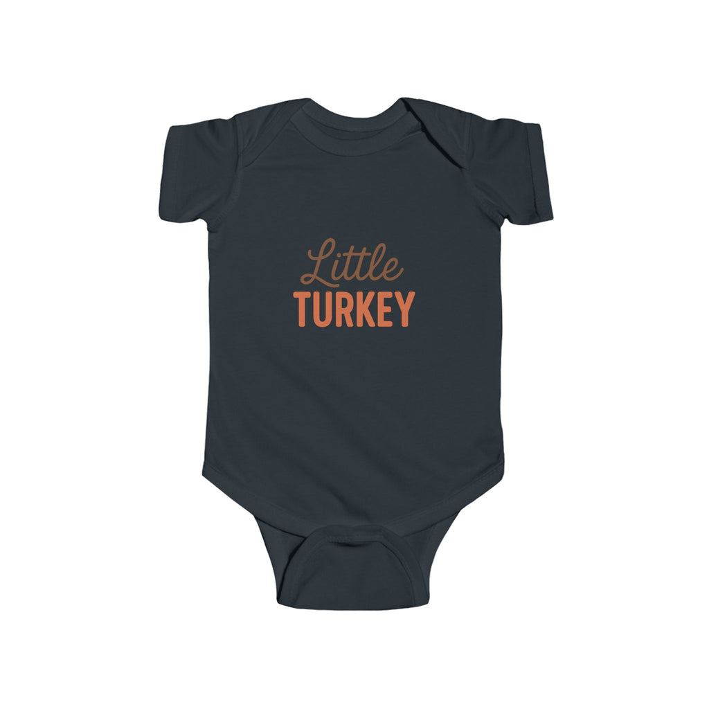 Navy blue baby onesie with 'Little Turkey' text on a white background