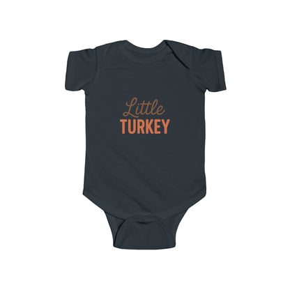 Navy blue baby onesie with 'Little Turkey' text on a white background