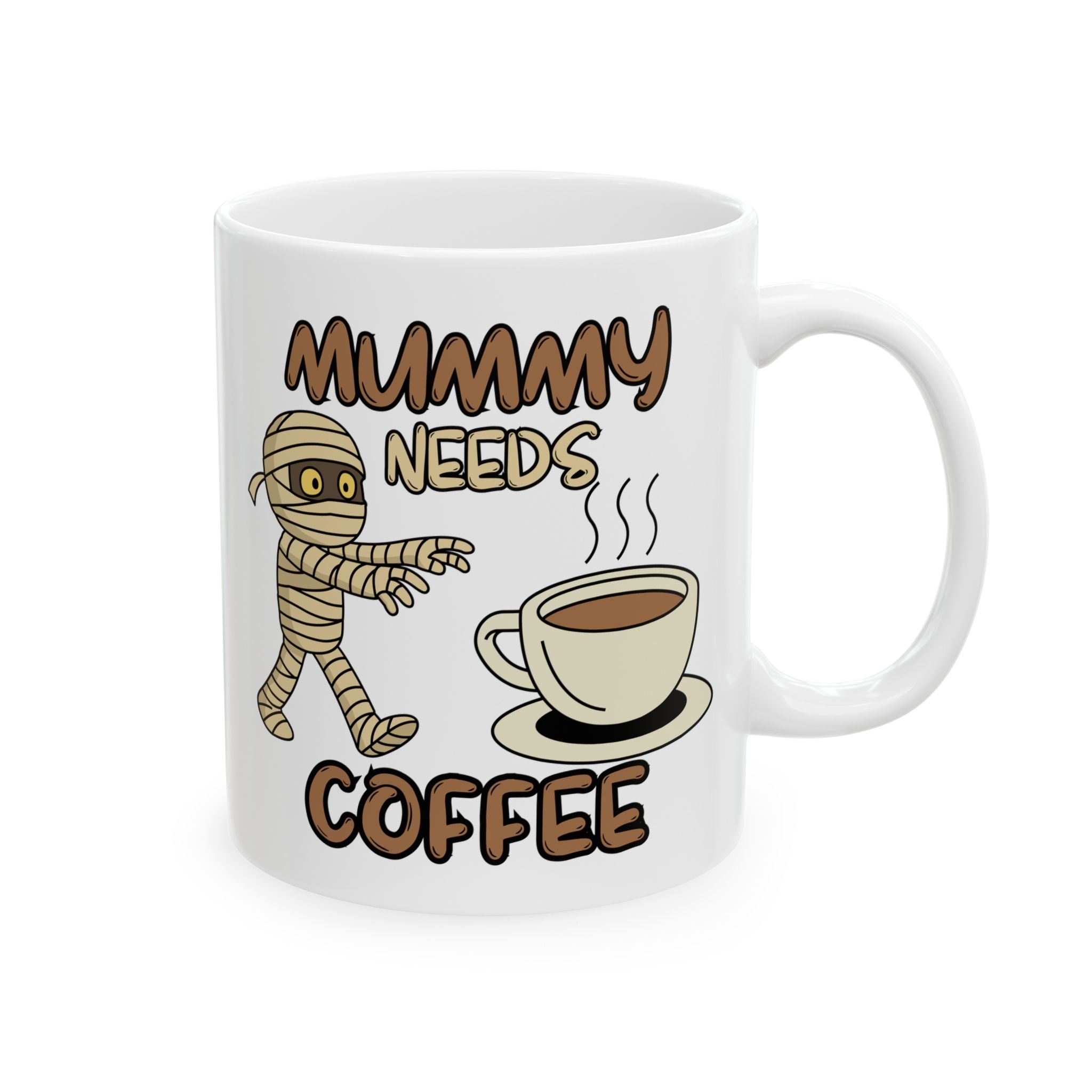 White ceramic mug with a cartoon mummy reaching for a cup of coffee beneath the words Mummy Needs Coffee, on a white background.