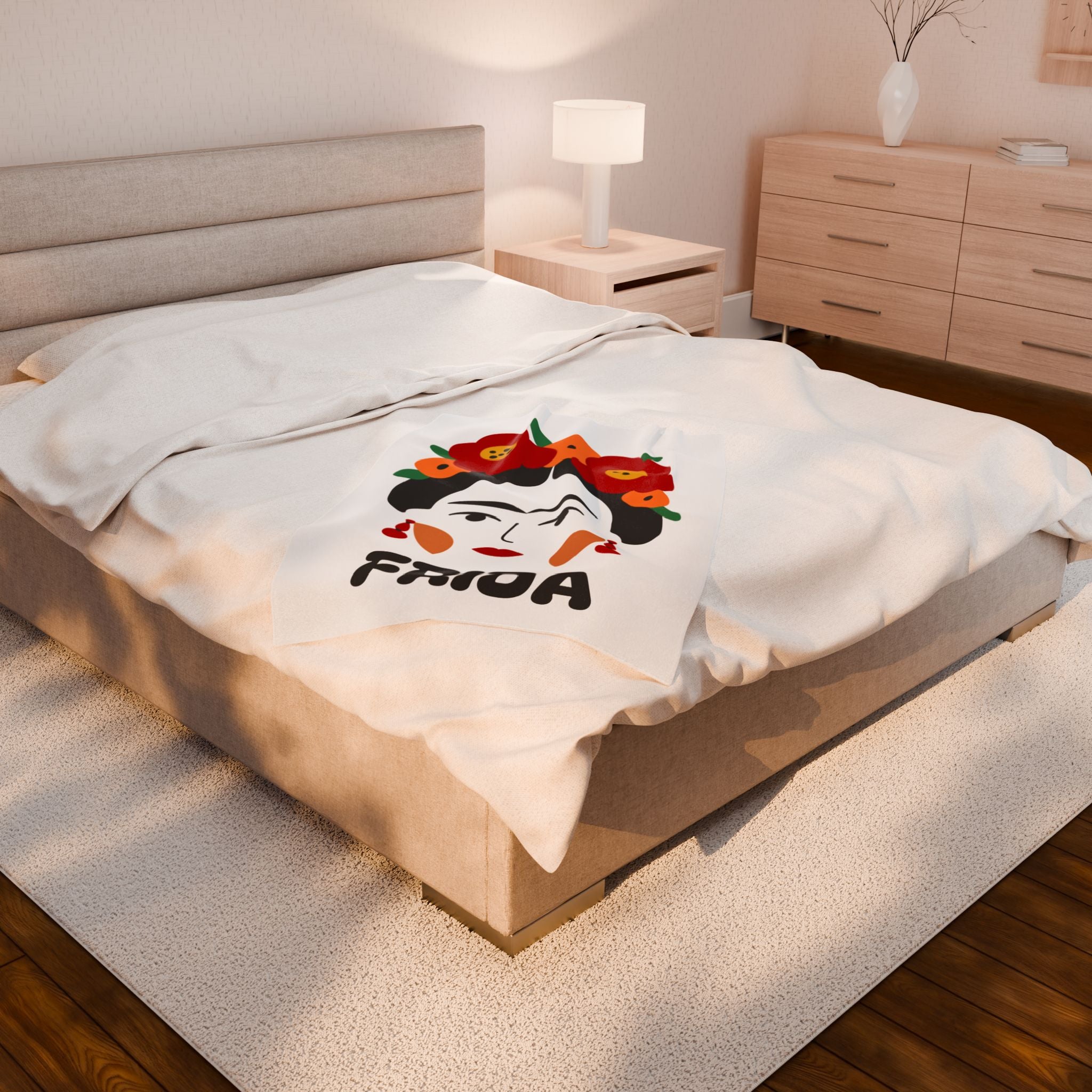 "Frida" Blanket on a large bed 