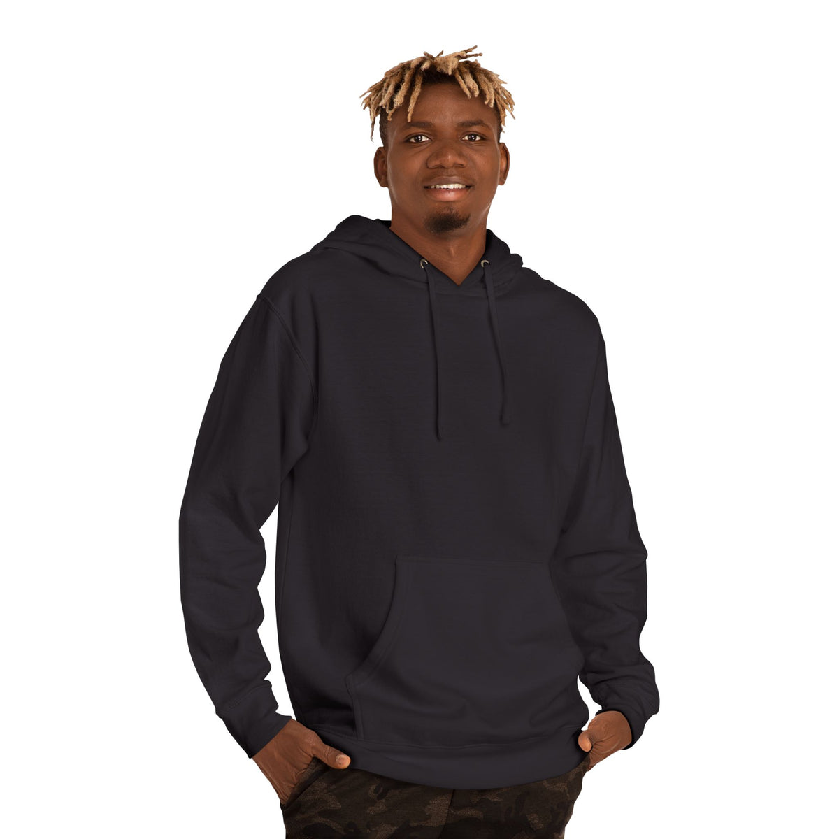 Man wearing the black comic dragon hoodie with hands in his pockets.