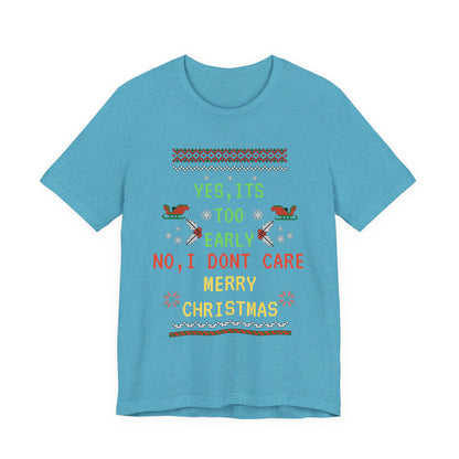 Blue t-shirt with Christmas-themed text and graphics on a white background