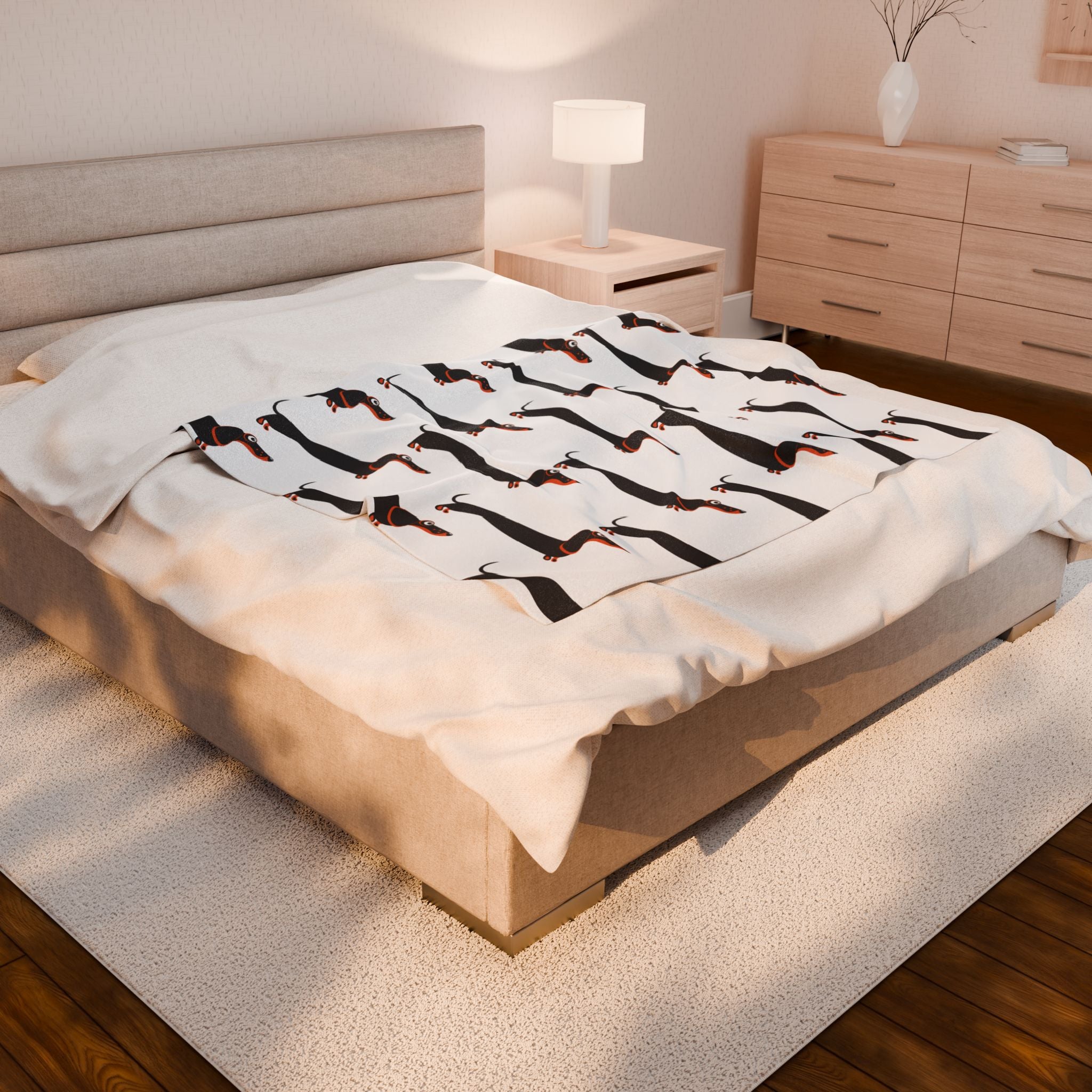 Dachshund blanket on bed in a bedroom 