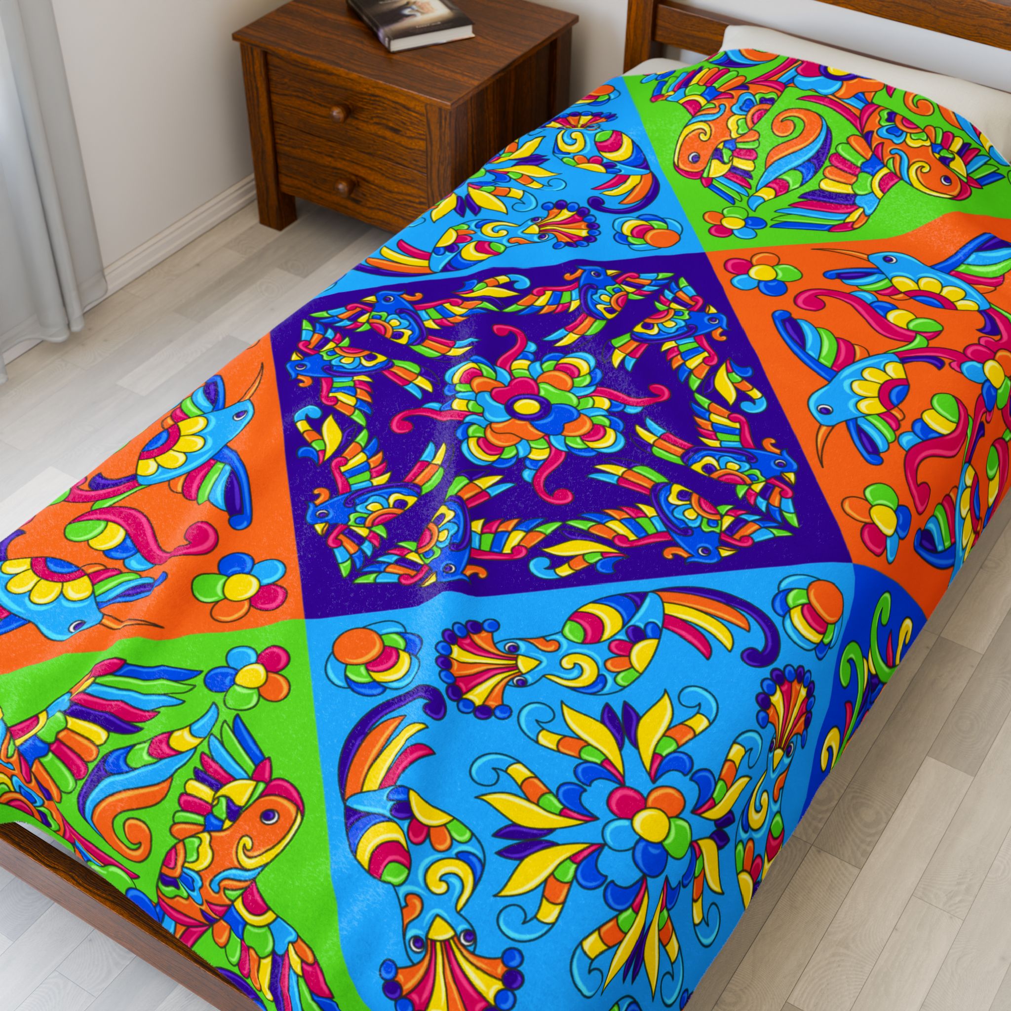 Rainbow patterned mandala blanket with detailed symmetrical design