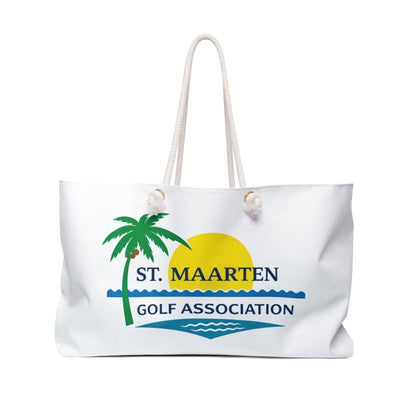 White tote bag with St. Maarten Golf Association logo featuring a palm tree and sun.
