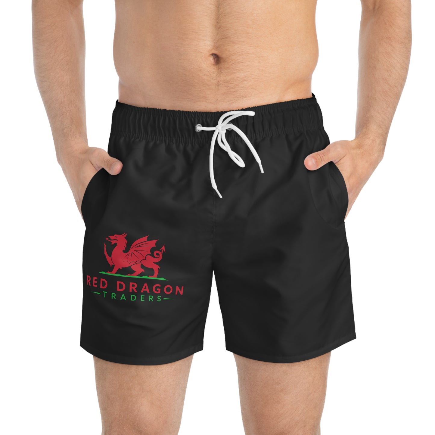 Black swim shorts with a red dragon logo on a white background