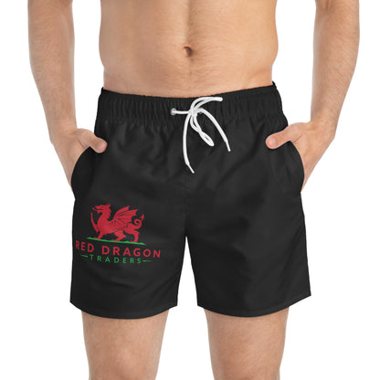 Black swim shorts with a red dragon logo on a white background