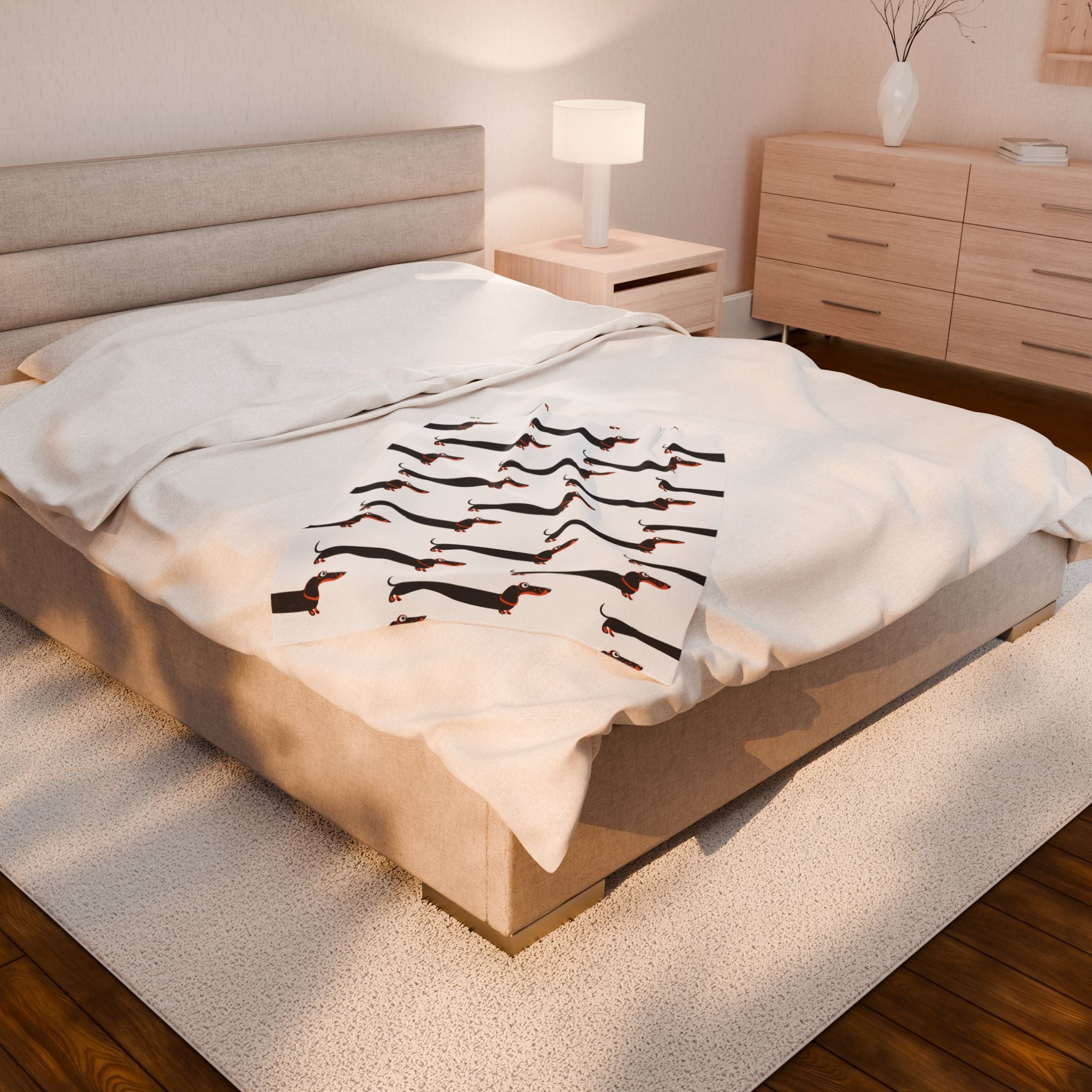 Dachshund blanket on a large bed 