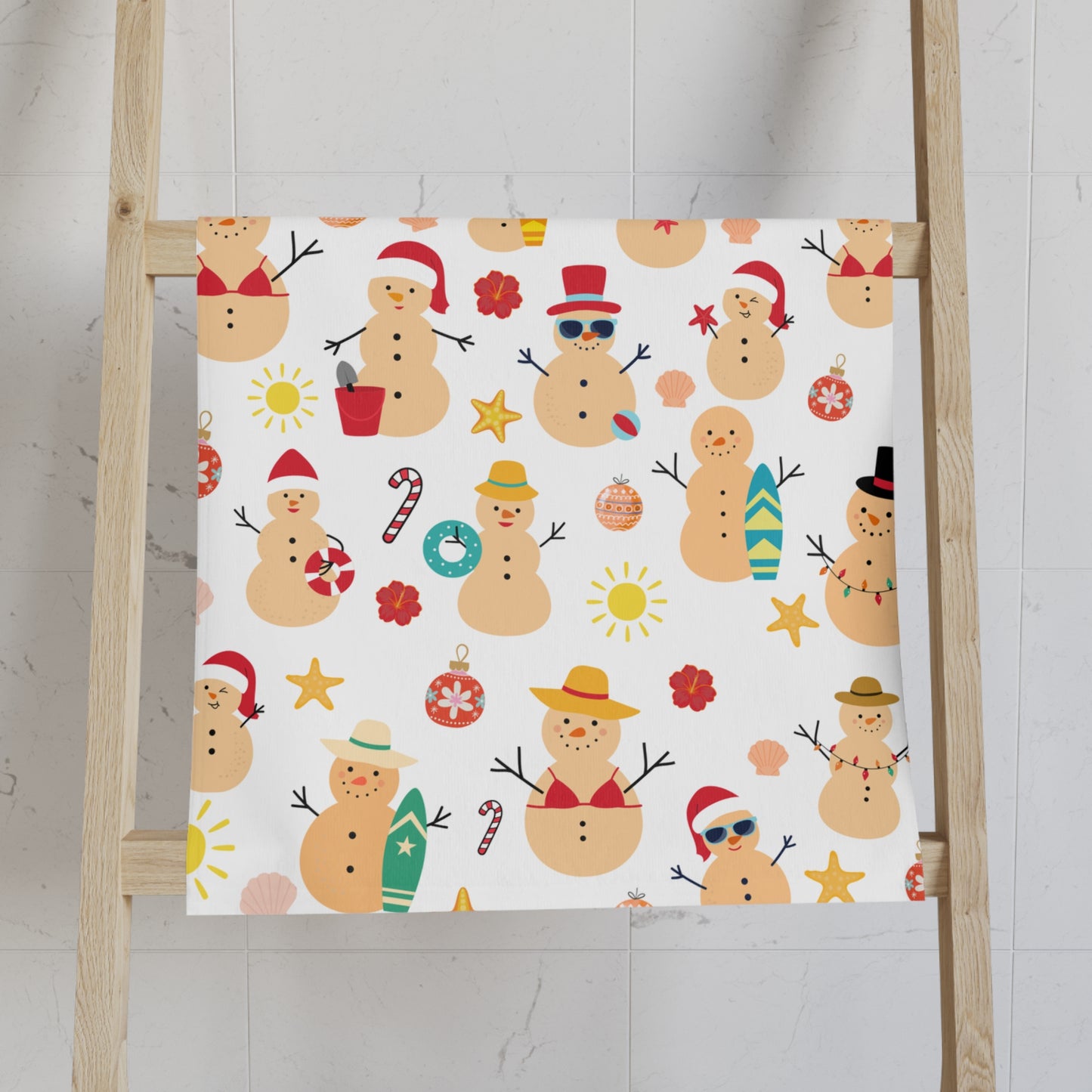 Fabric with a pattern of cartoon snowmen on a wooden ladder against a light background