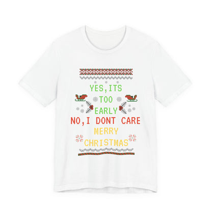 White t-shirt with Christmas-themed text and graphics on a white background