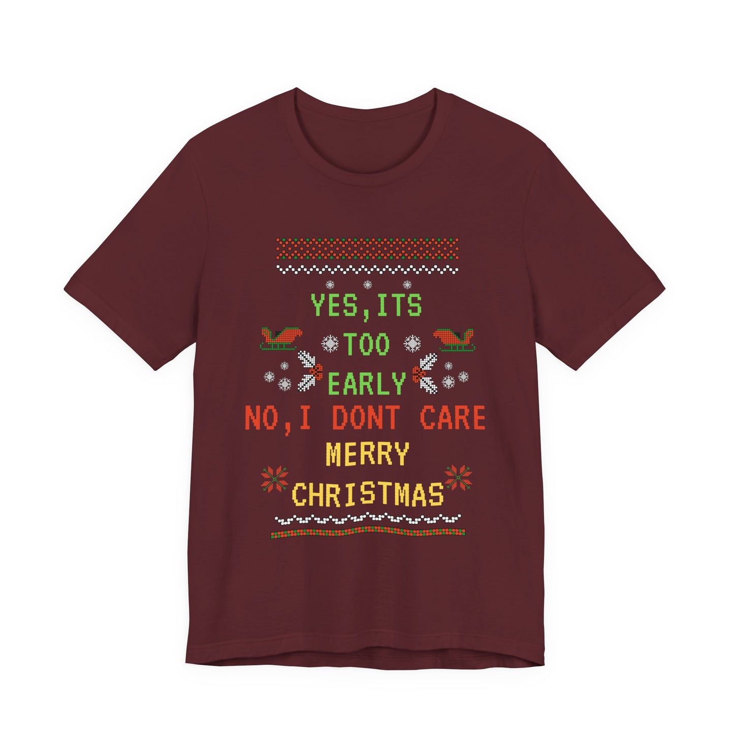 Maroon t-shirt with Christmas-themed text and graphics on a white background
