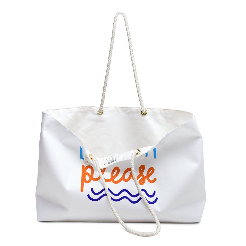 White canvas weekender tote with rope handles, angled view showing the interior and 'please' script, on a white background
