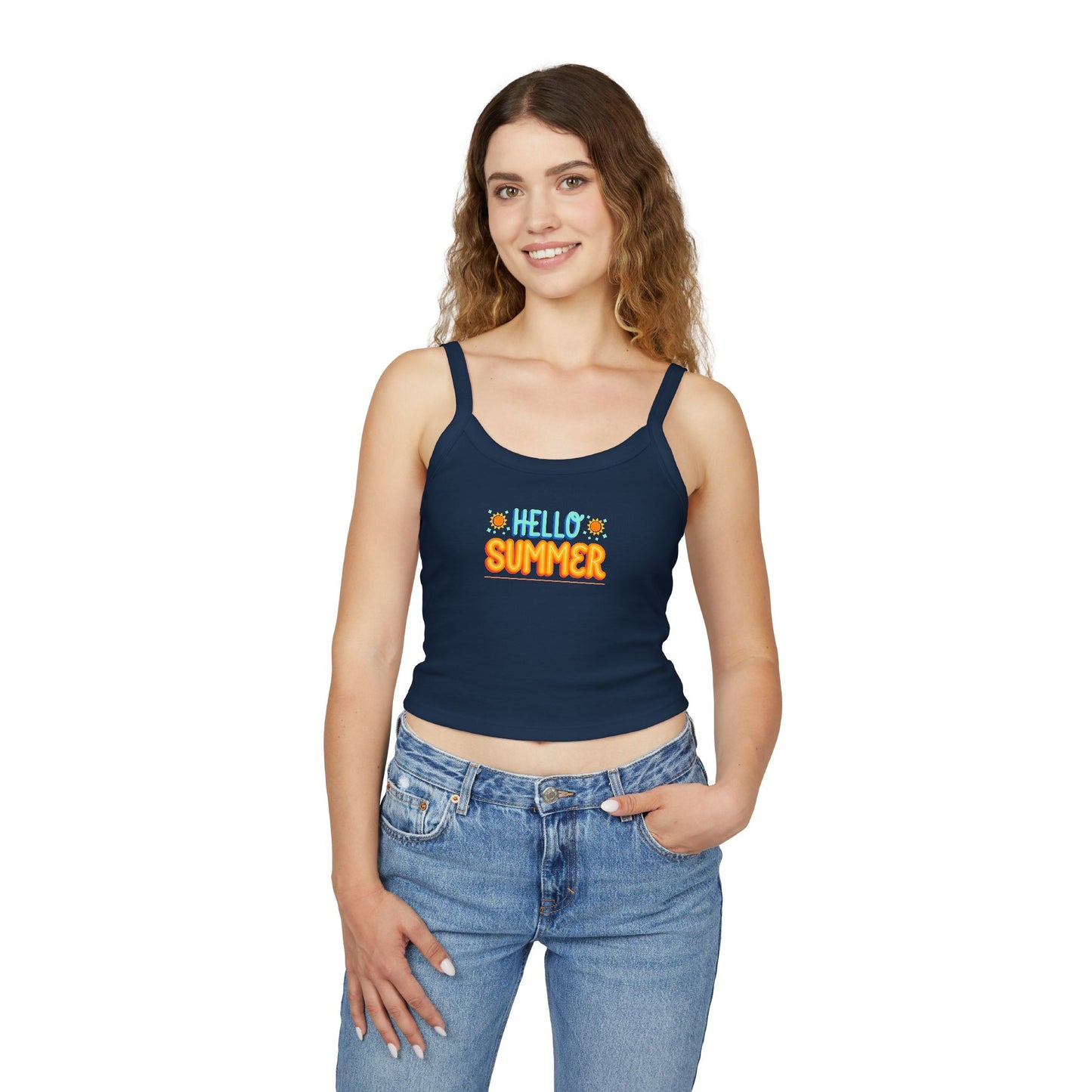 Woman wearing a navy tank top with a colorful graphic and blue jeans on a white background