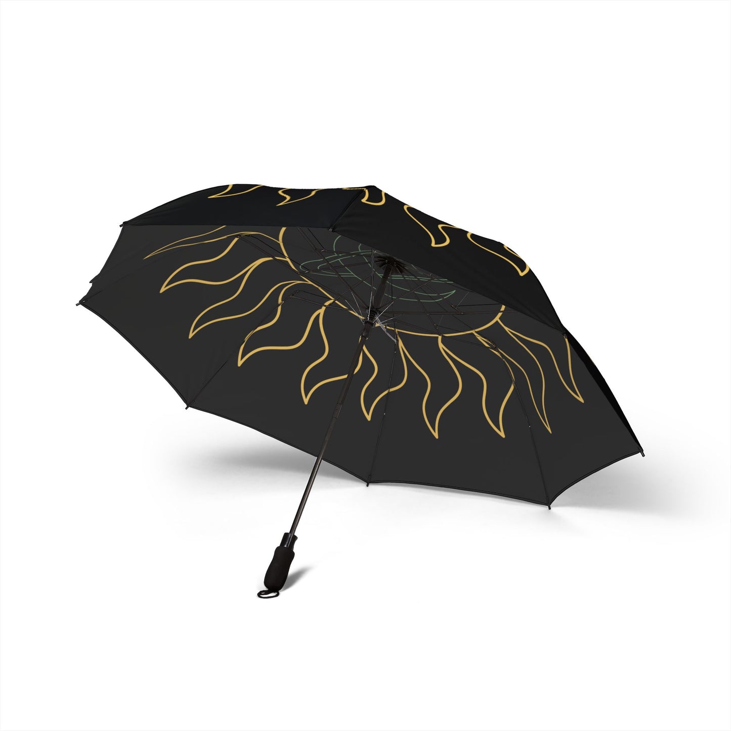 Black umbrella with gold abstract design on a white background