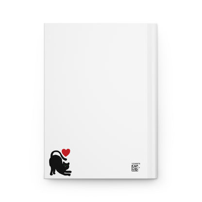 Journal with the back showing and black cat 