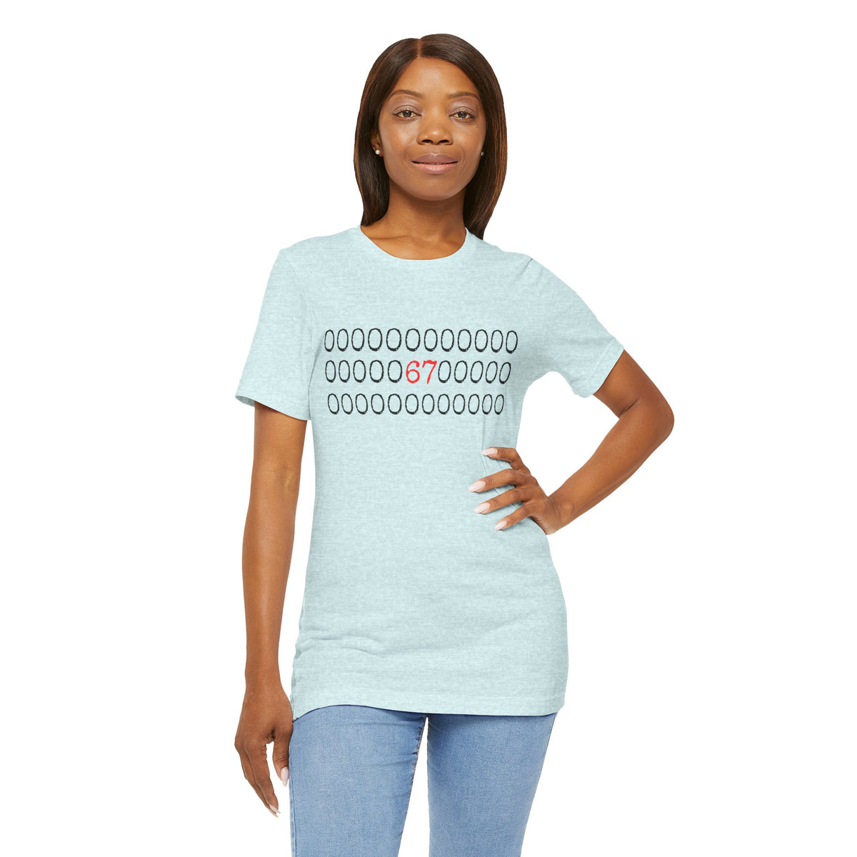 Ice blue heather t-shirt with rows of circles and a red '67' graphic, worn by a woman with jeans