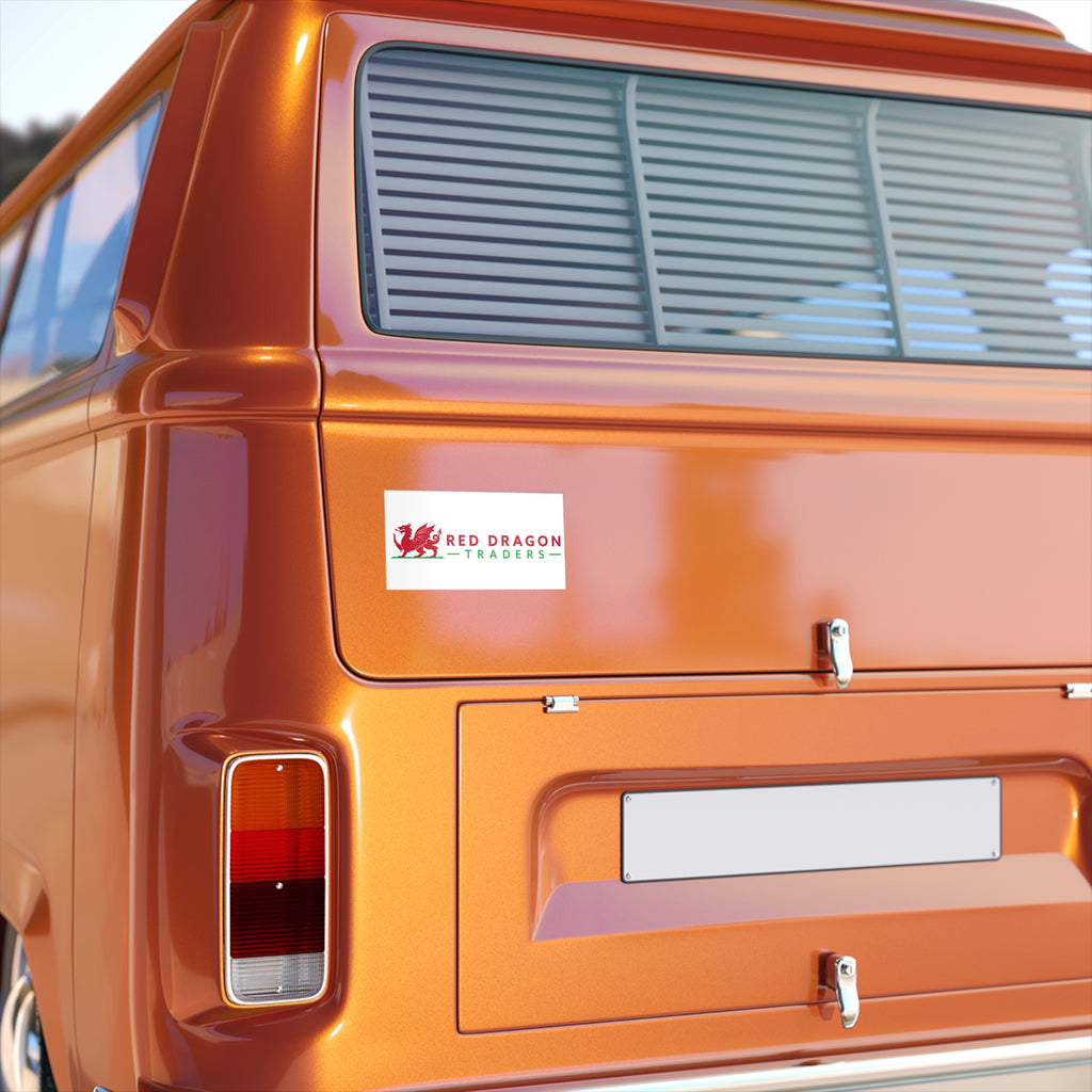 Orange vehicle with a Red Dragon Traders logo on the back door.