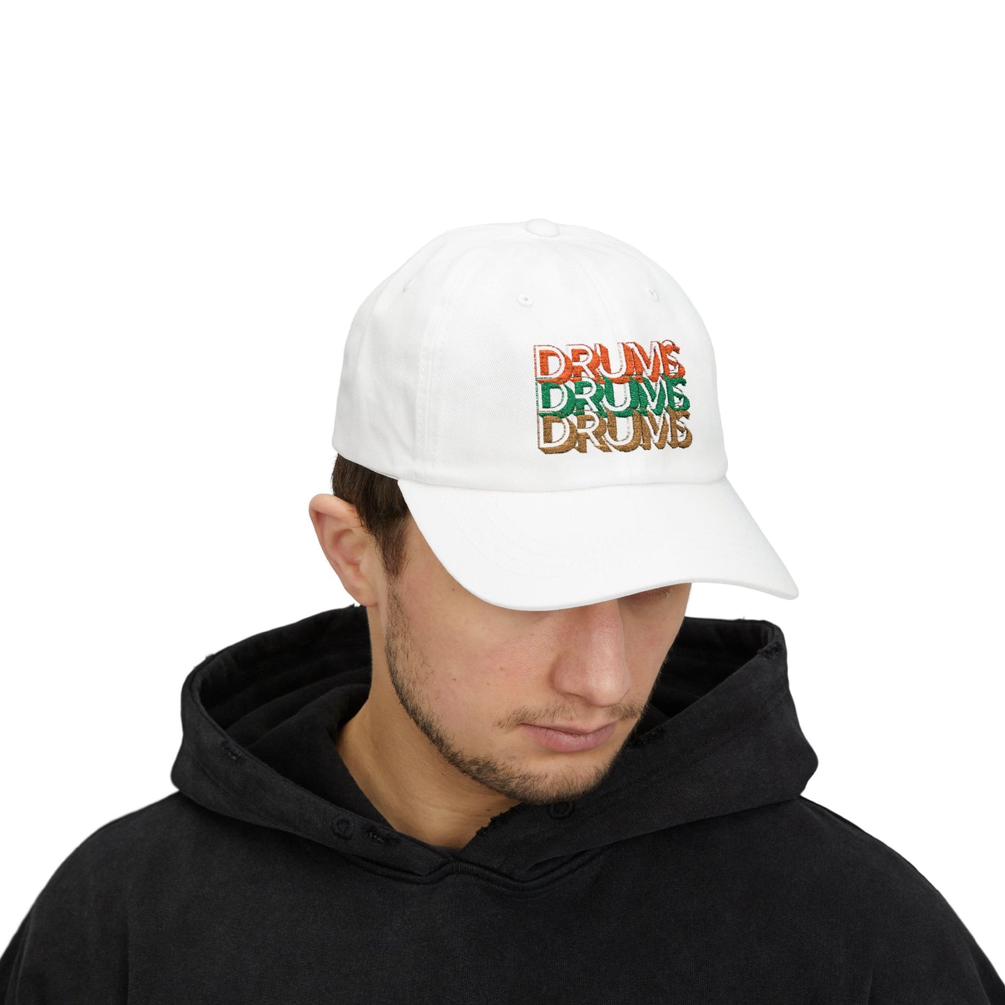 Person wearing a white cap with colorful text on a white background