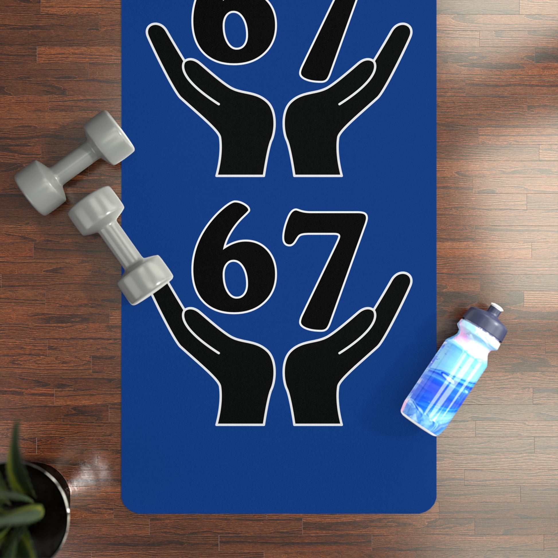 Blue mat with black hand and number design, dumbbells, and water bottle on a wooden floor.