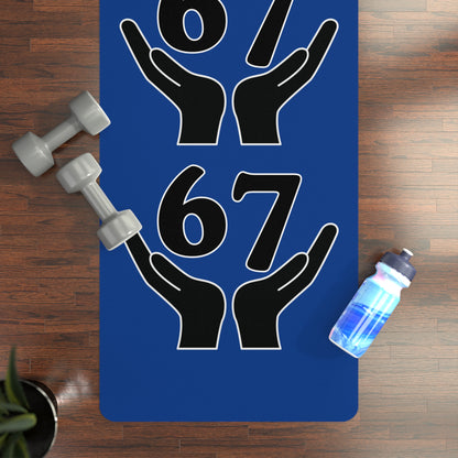 Blue mat with black hand and number design, dumbbells, and water bottle on a wooden floor.