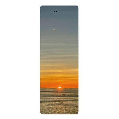 Yoga mat with a sunset design on a white background