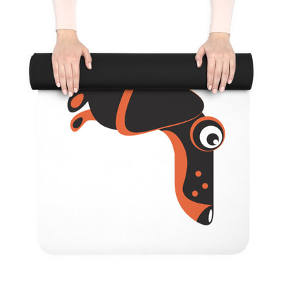 Yoga mat with dachshund design held by a person on a white background
