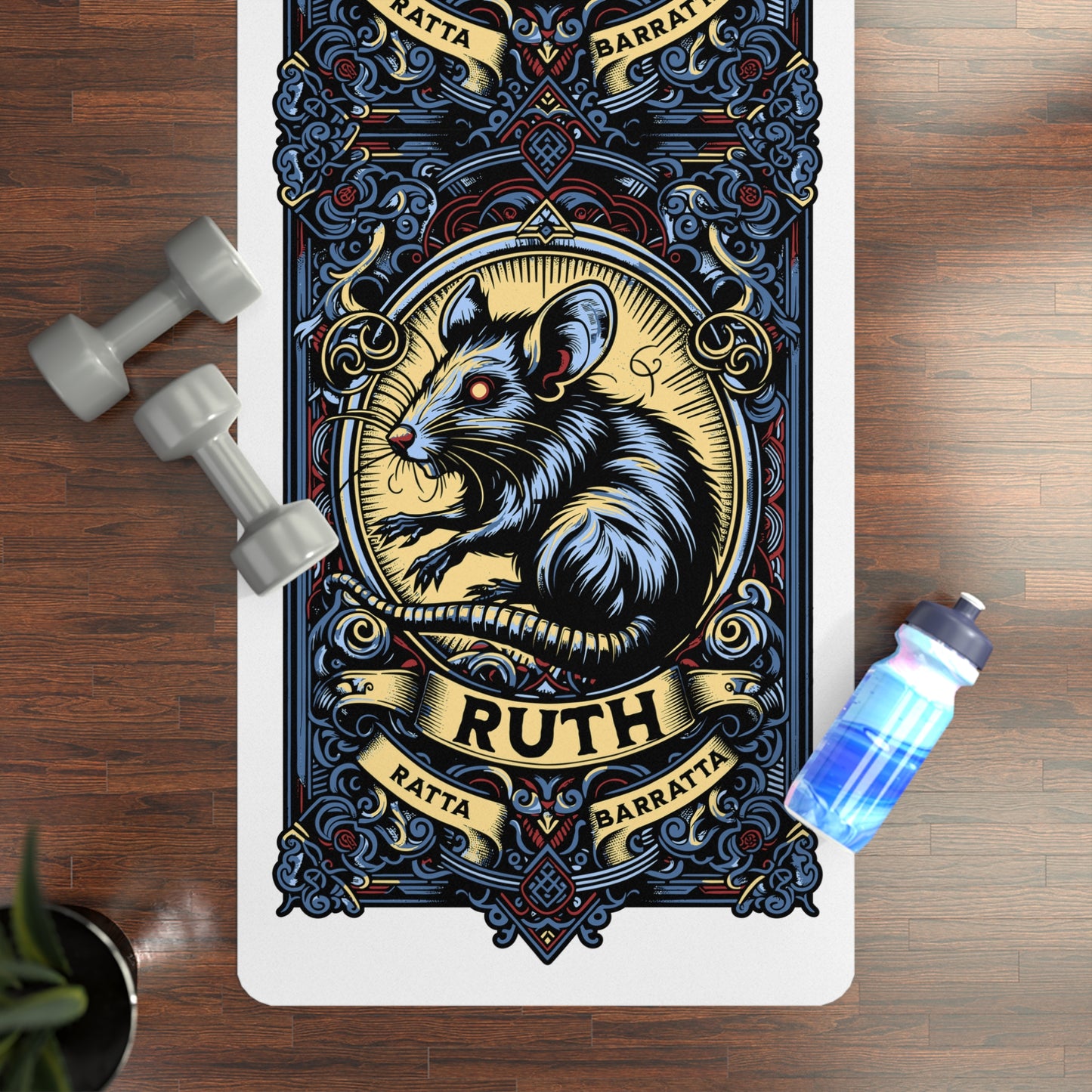 Decorative yoga mat with a rat illustration and 'Ruth' text on a wooden floor with weights and a water bottle.