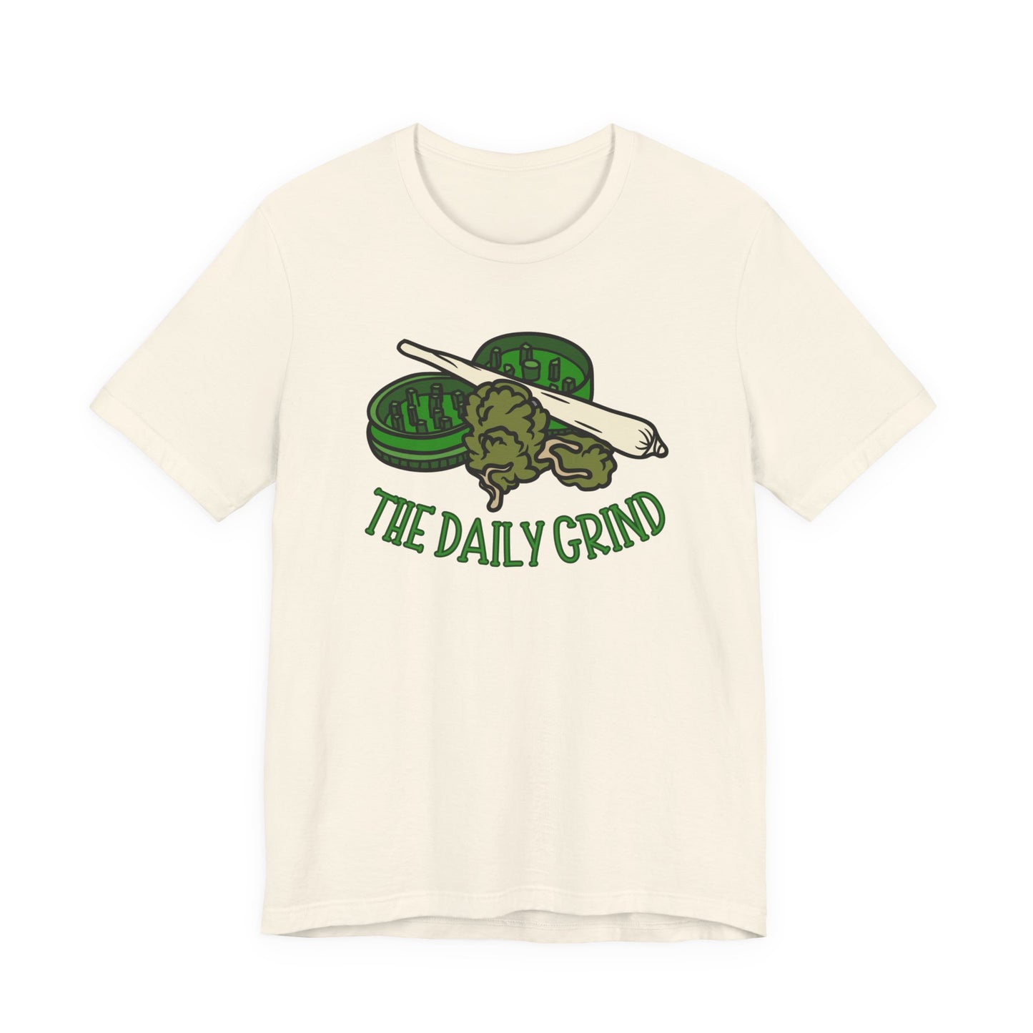 Beige t-shirt with green graphic and 'The Daily Grind' text on a white background