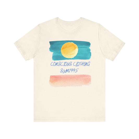 Beige t-shirt with watercolor design and text on a white background