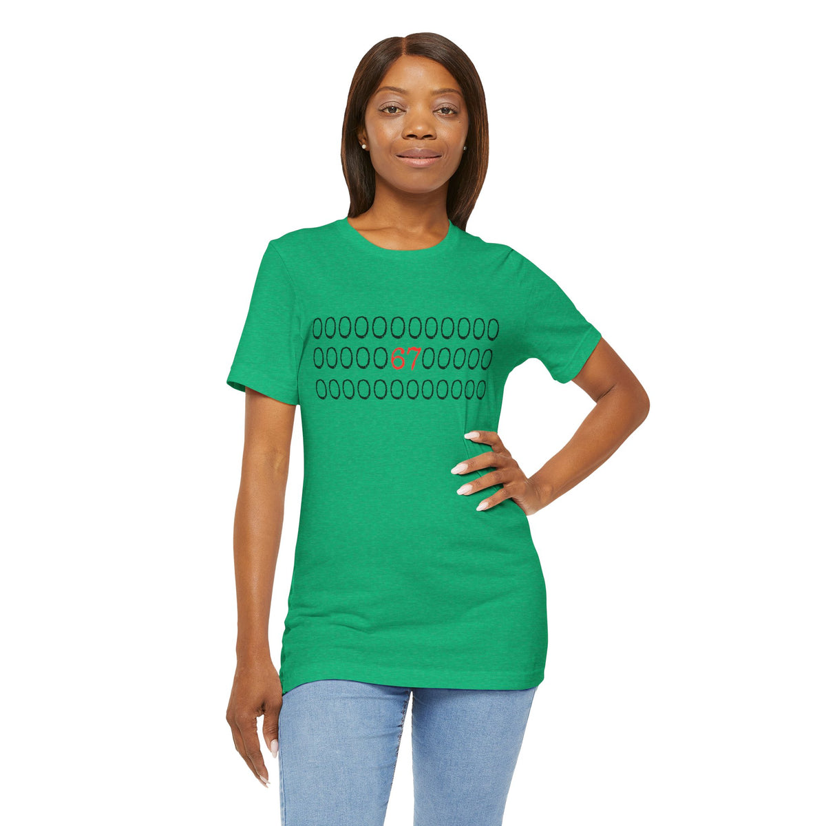 Kelly green t-shirt with rows of circles and a '67' graphic, worn by a woman with jeans