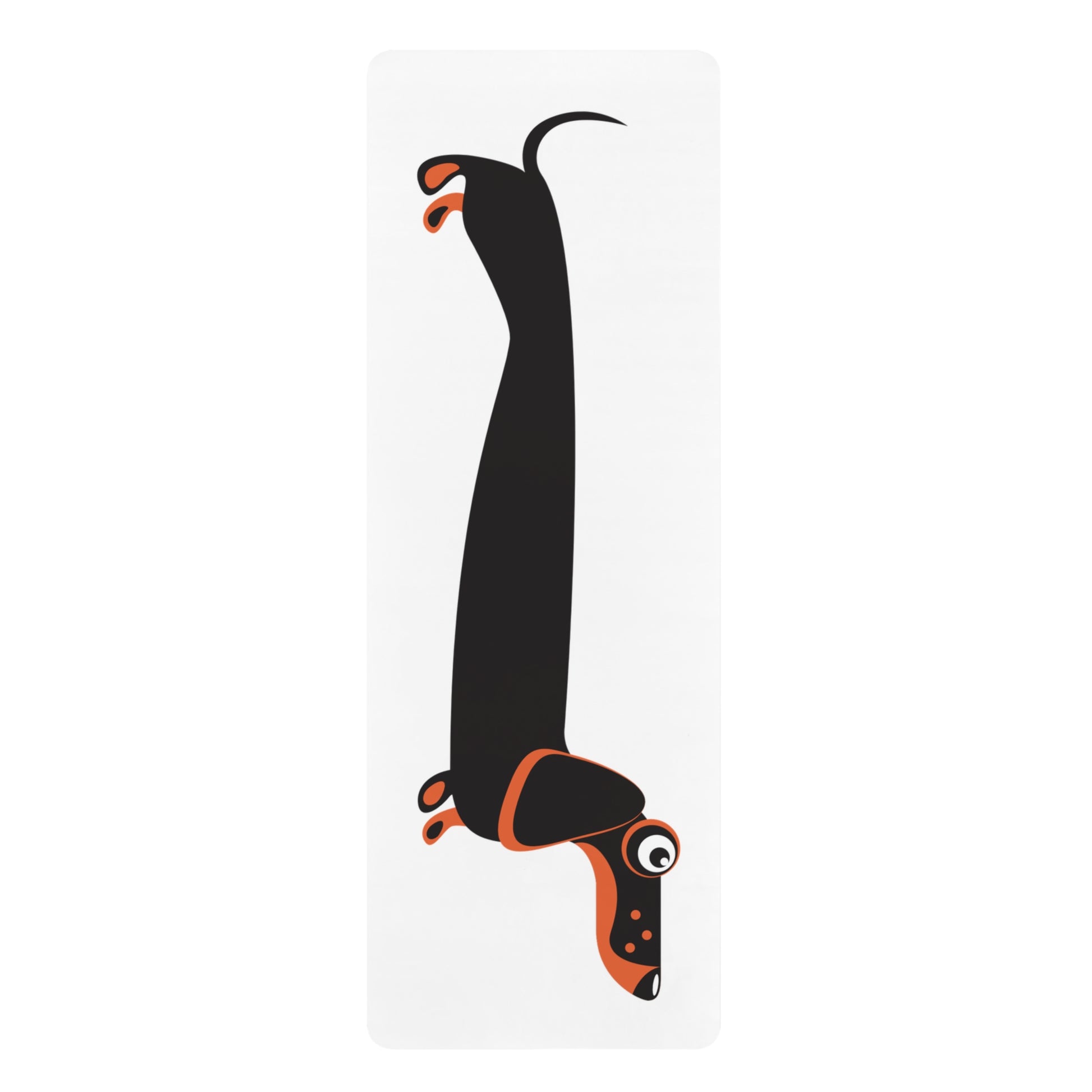 Black and orange dachshund on a white yoga mat