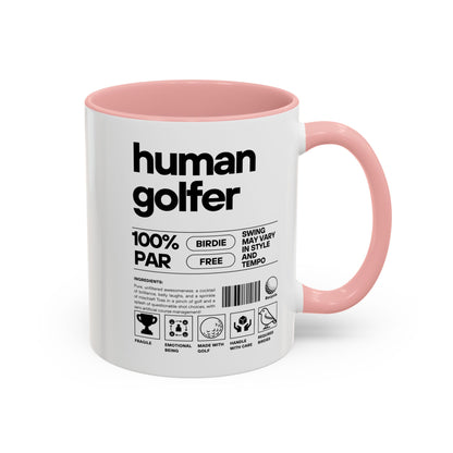 Mug with pink interior and handle featuring humorous golf-themed text on a white background