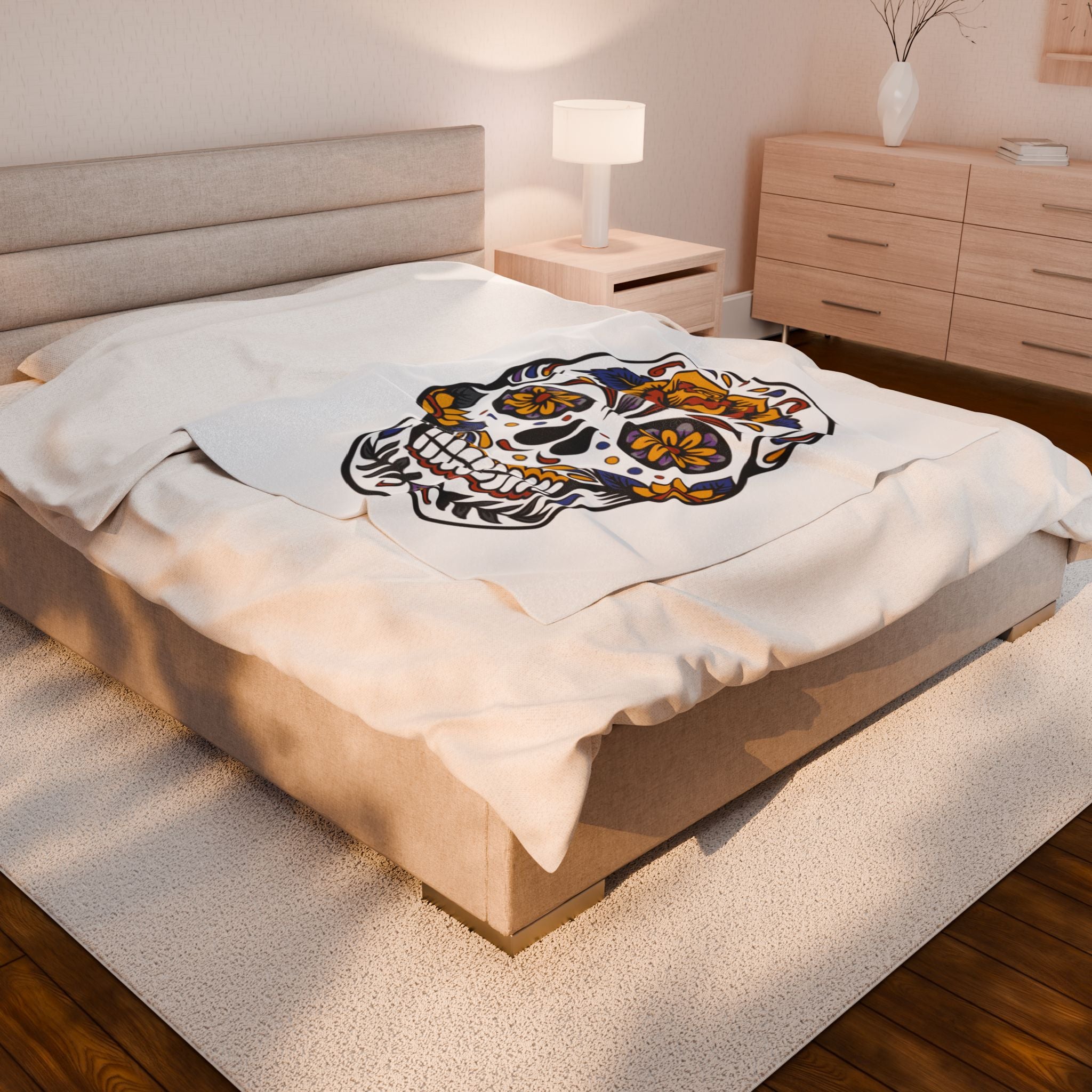 Sugar skull blanket in a bedroom setting.
