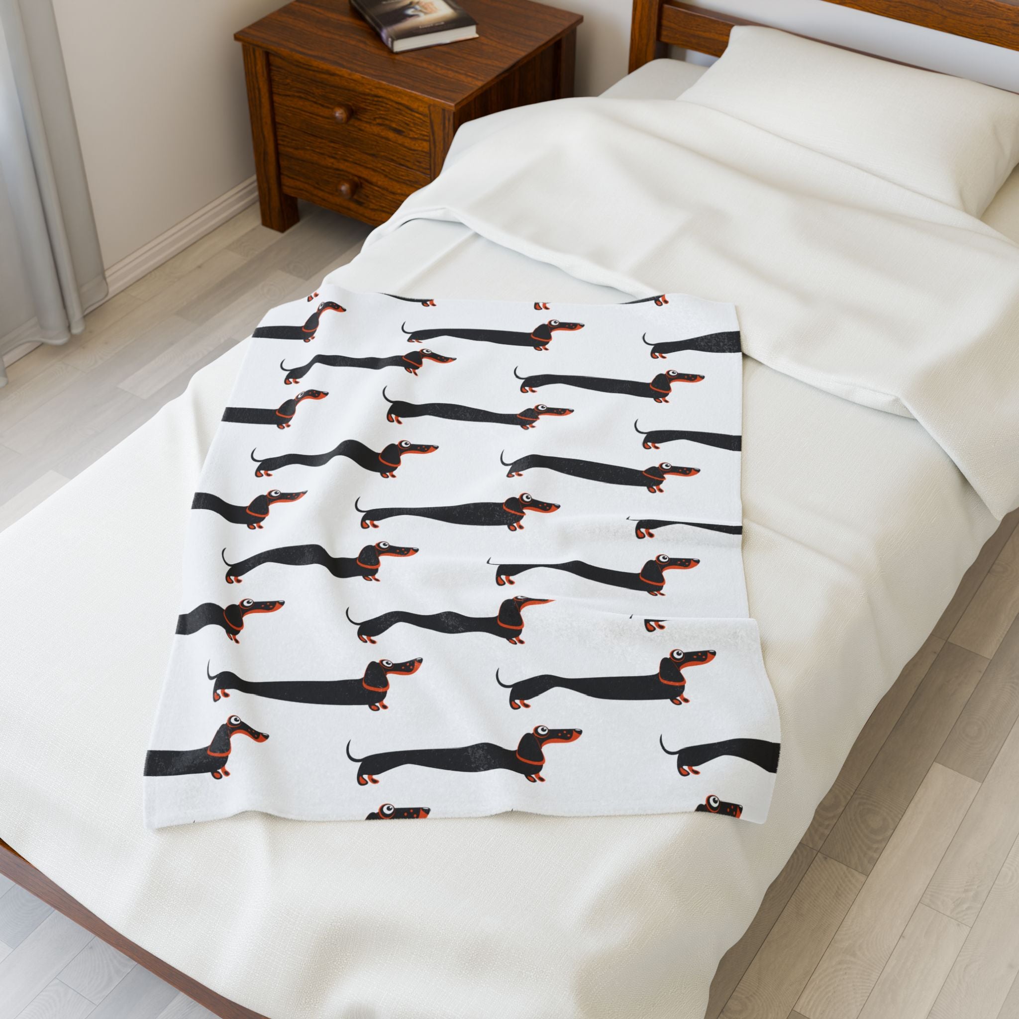 Dachshund blanket on small bed 