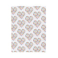 Hearts blanket with rainbow music notes inside heart shapes
