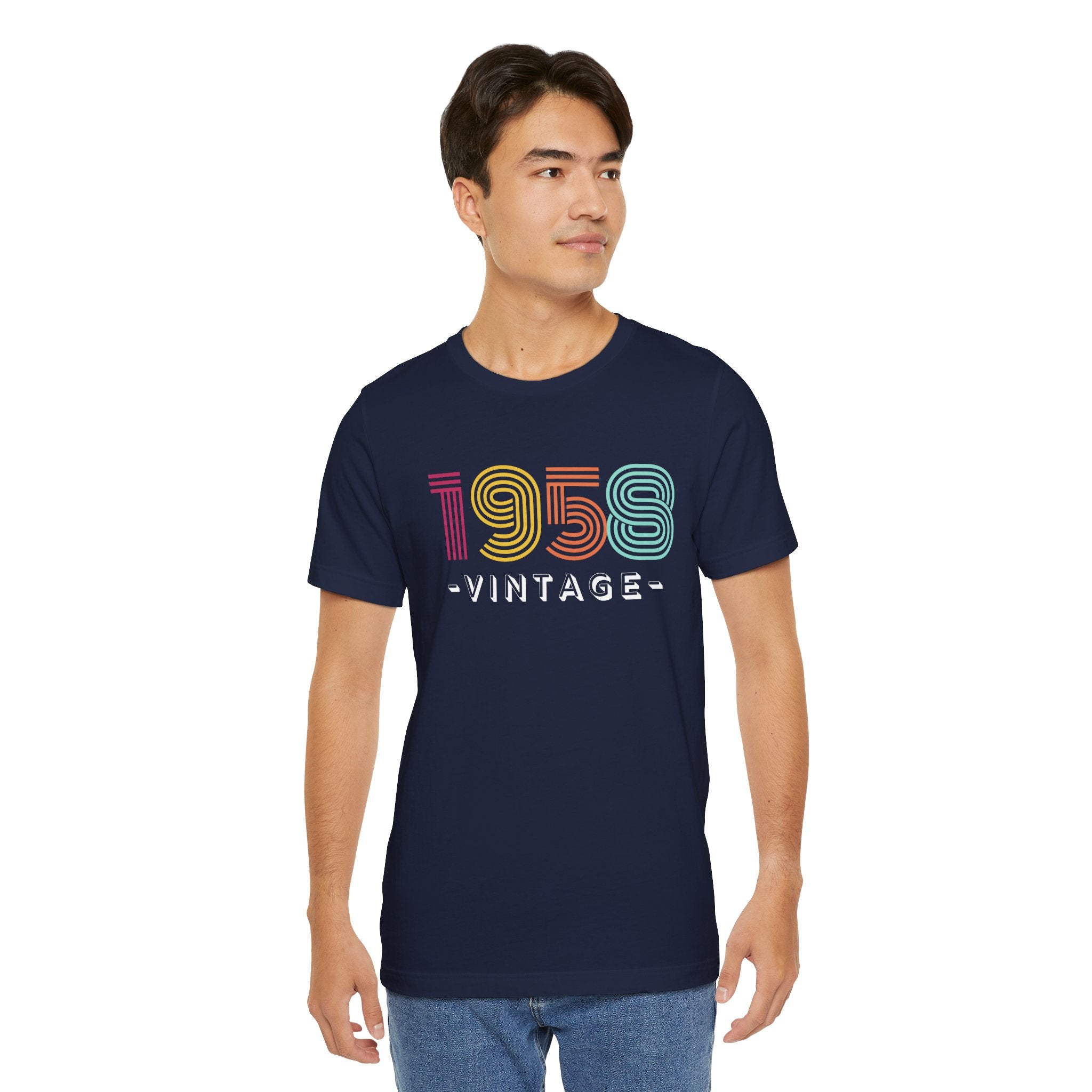 Man wearing a navy blue t-shirt with '1958 Vintage' design on a white background